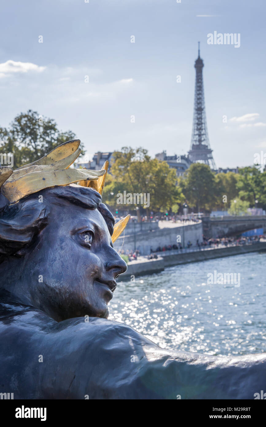 Statue of bridge Alexandre III and Eiffel tower, Paris, France Stock Photo