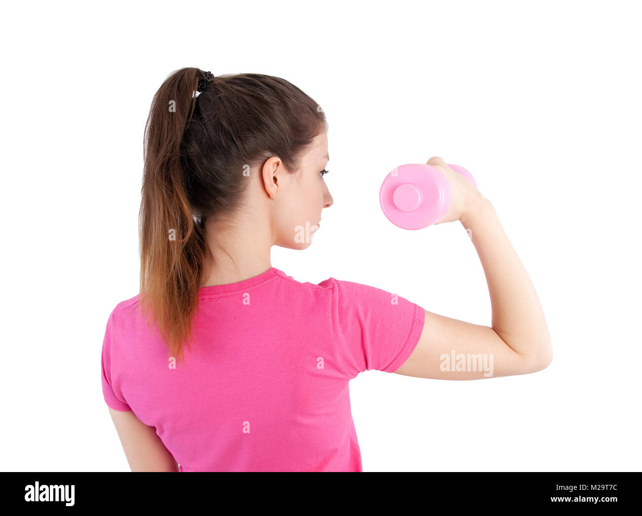 beautiful young woman with dumbbell Stock Photo