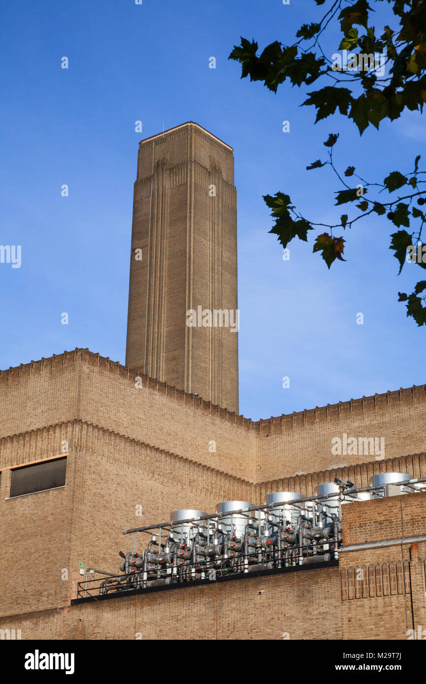 Brick chimney and walls of the Bankside Power Station, a former electricity generating station now Tate Modern museum located  in the Bankside area of Stock Photo