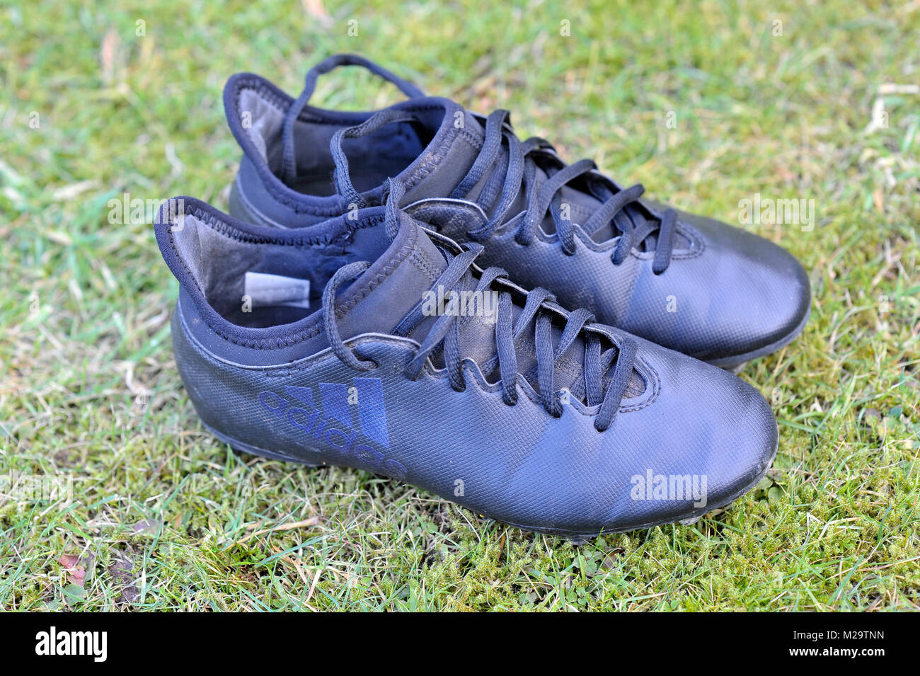 Kids football boots hires stock photography and images Alamy