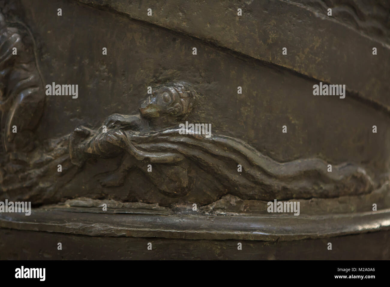 Allegory of the Jordan River. Romanesque bronze relief on the Bernward Column (Bernwardssäule), also known as the Christ Column (Christussäule) in the Hildesheim Cathedral (Hildesheimer Dom) in Hildesheim in Lower Saxony, Germany. Stock Photo