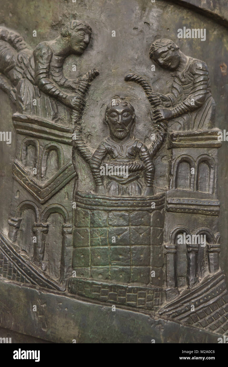 Arrest of Saint John the Baptist. Romanesque bronze relief on the Bernward Column (Bernwardssäule), also known as the Christ Column (Christussäule) in the Hildesheim Cathedral (Hildesheimer Dom) in Hildesheim in Lower Saxony, Germany. Stock Photo