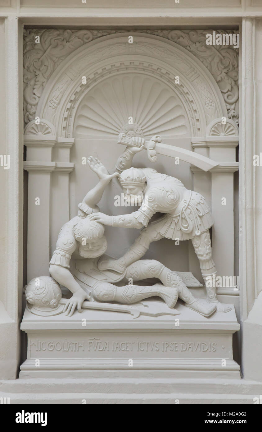 David and Goliath. Plaster cast of the relief from the Renaissance altarpiece by German sculptor Johann Brabender (1546) from the Hildesheimer Domlettner on display in the Cathedral Museum (Dom Museum) in Hildesheim in Lower Saxony, Germany. Stock Photo