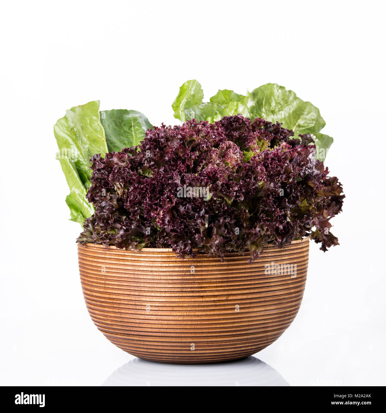 Vegetable: Fresh Red Leaf Lettuce and Green Romaine Lettuce in Brown Wooden Bowl Isolated on White Background Stock Photo