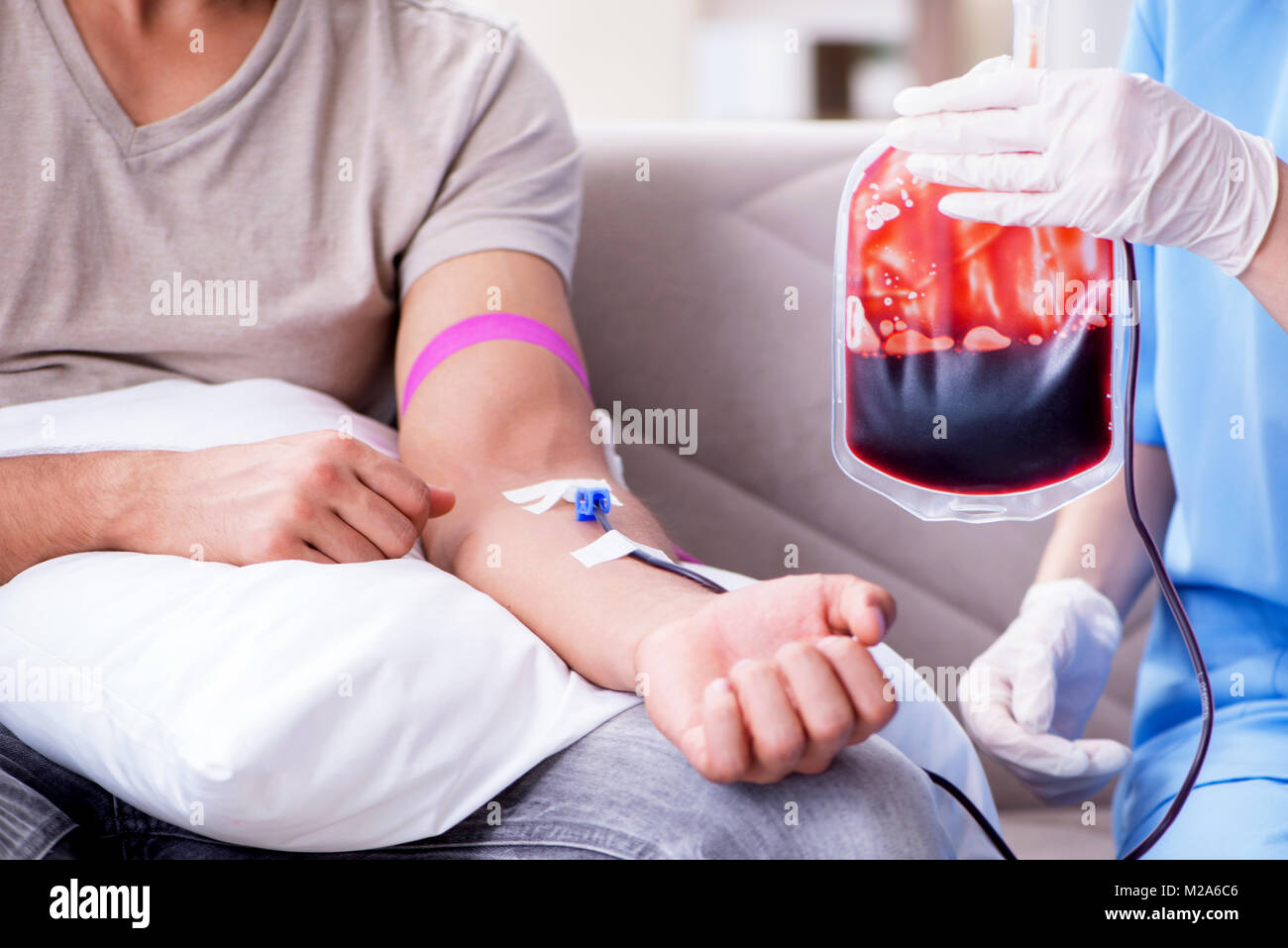 Patient getting blood transfusion in hospital clinic Stock Photo Alamy
