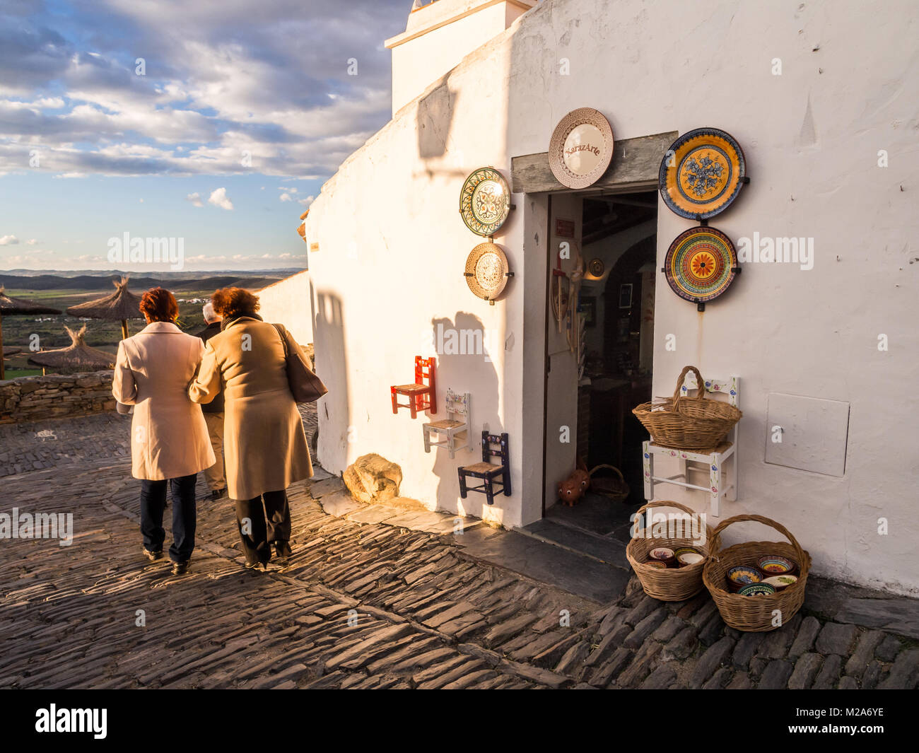 MONSARAZ, PORTUGAL - JANUARY 28, 2018: Small store with typical plates in Monsaraz in Alentejo region, Portugal, at sunset. Stock Photo