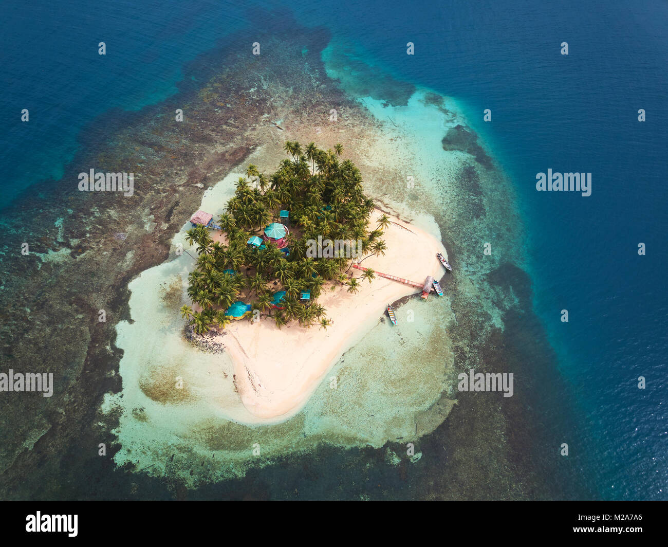 One tropical island in caribbean sea above view Stock Photo - Alamy