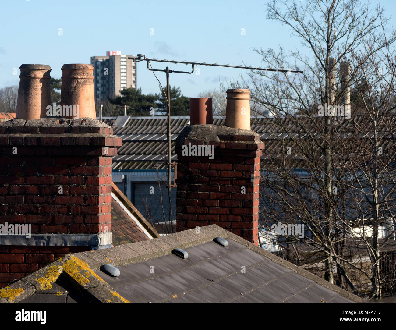 View of chimneys and rooftops with TV aerial, Southampton, Hampshire, England, United KIngdom Stock Photo