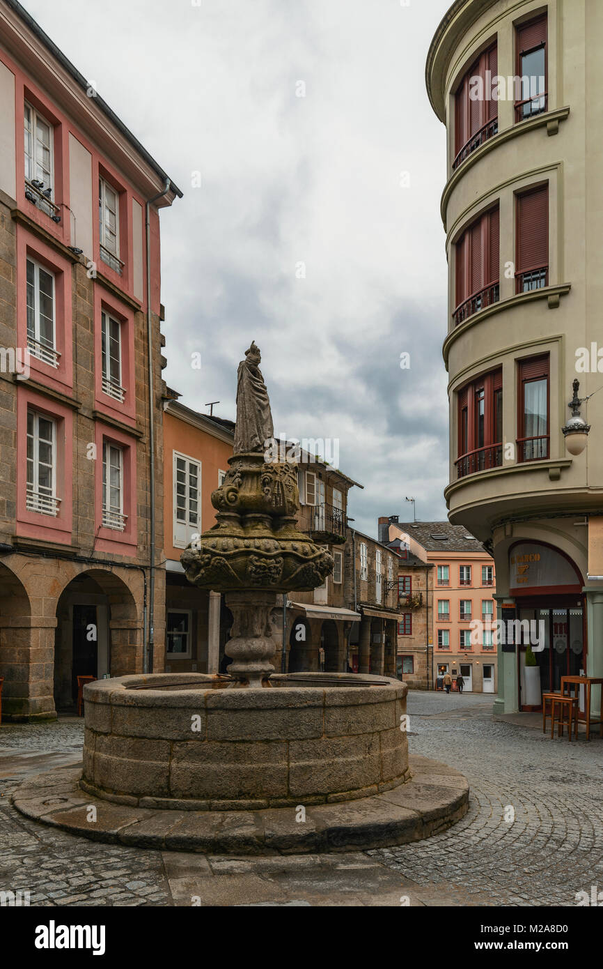 Small plaza do Campo and fountain of San Vicente Ferrer, old medieval market in the city of Lugo, region of Galicia, Spain, Europe Stock Photo
