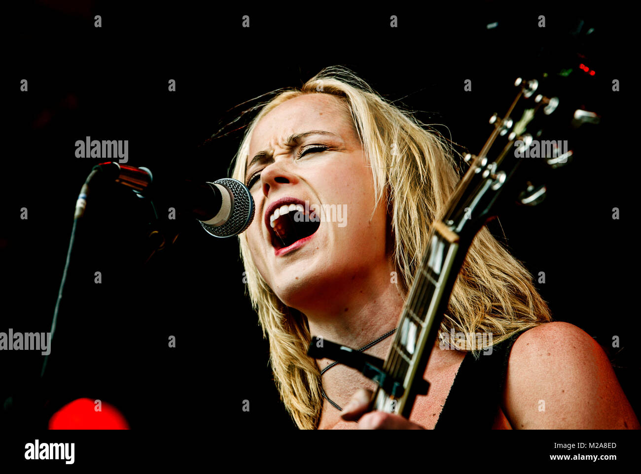 The Danish singer, musician and songwriter Tina Dickow (known as Tina Dico  abroad) performs a live concert a live concert at the Orange Stage at  Roskilde Festival 2008. Denmark, 06/07 2008 Stock Photo - Alamy