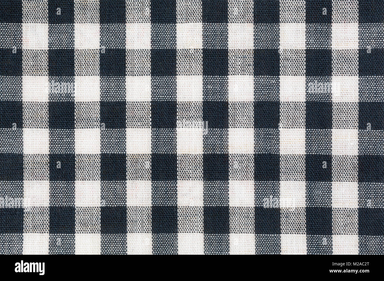 Close view of black and white cloth in a checkerboard pattern. Stock Photo