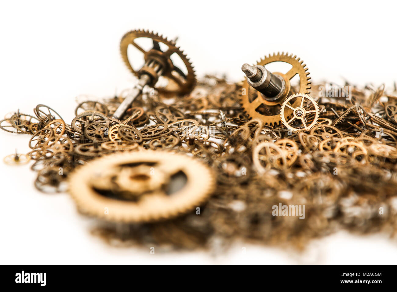 A picture of a small batch of cogwheels on a white background. Stock Photo