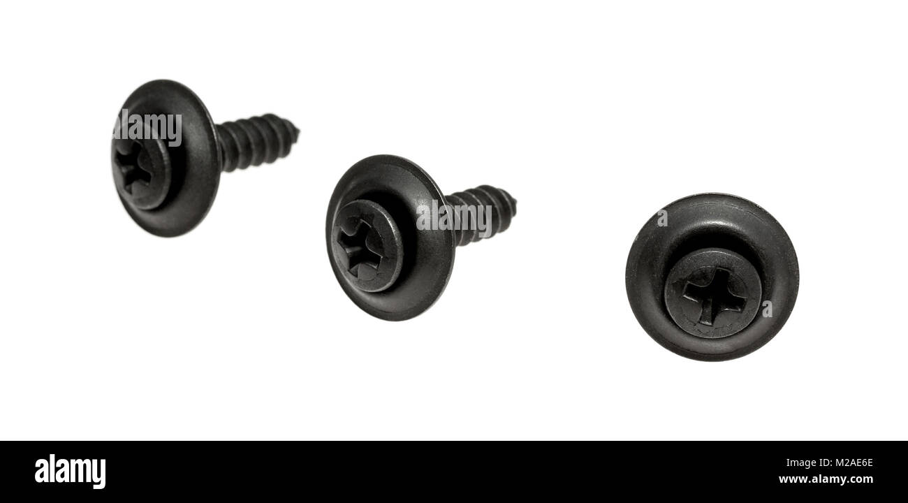 Three black trim head screws isolated on a white background Stock Photo