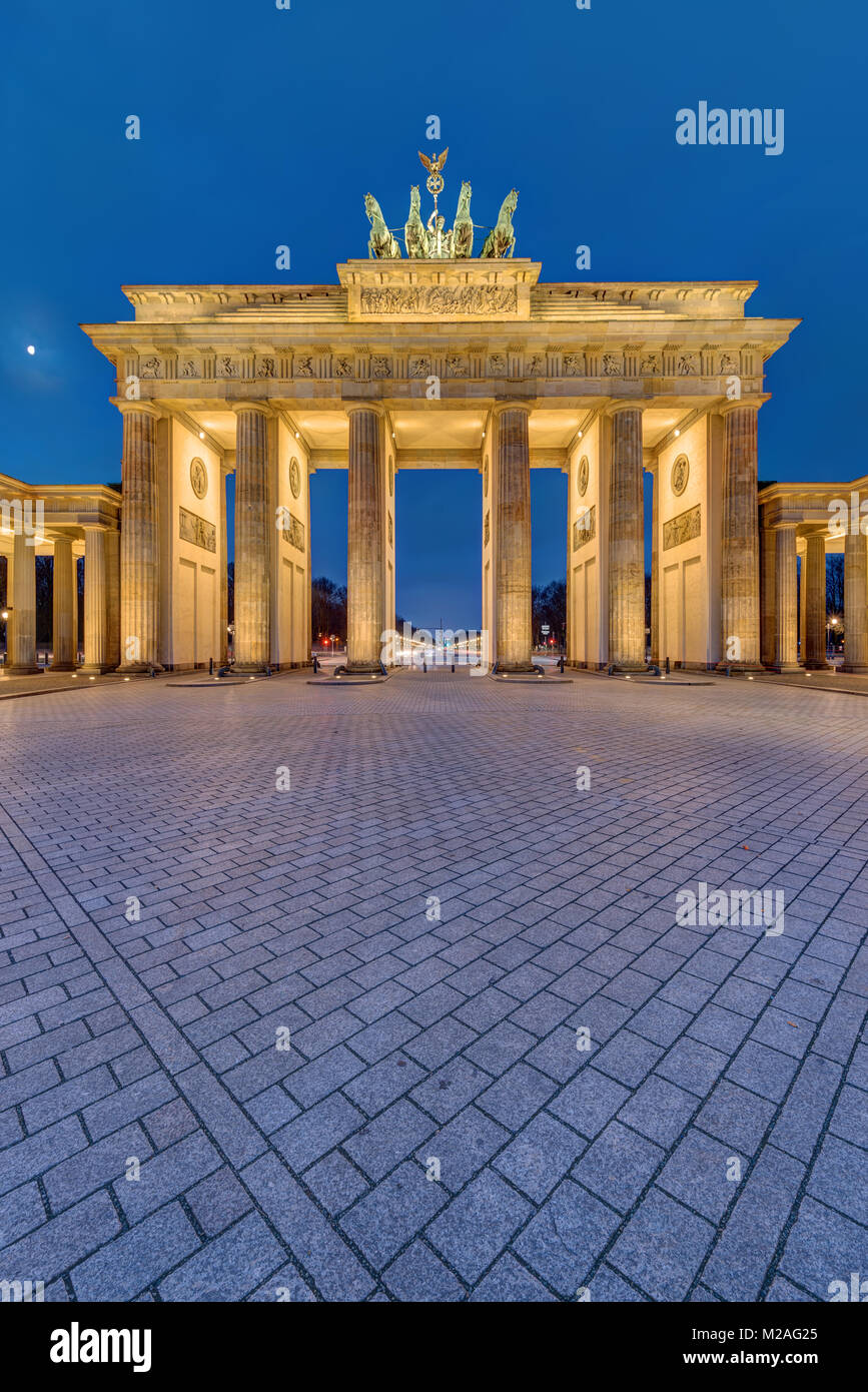 The famous illuminated Brandenburg Gate in Berlin early in the morning Stock Photo