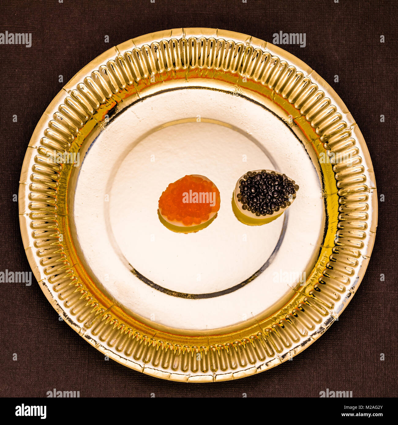 Quail eggs with caviar Stock Photo - Alamy