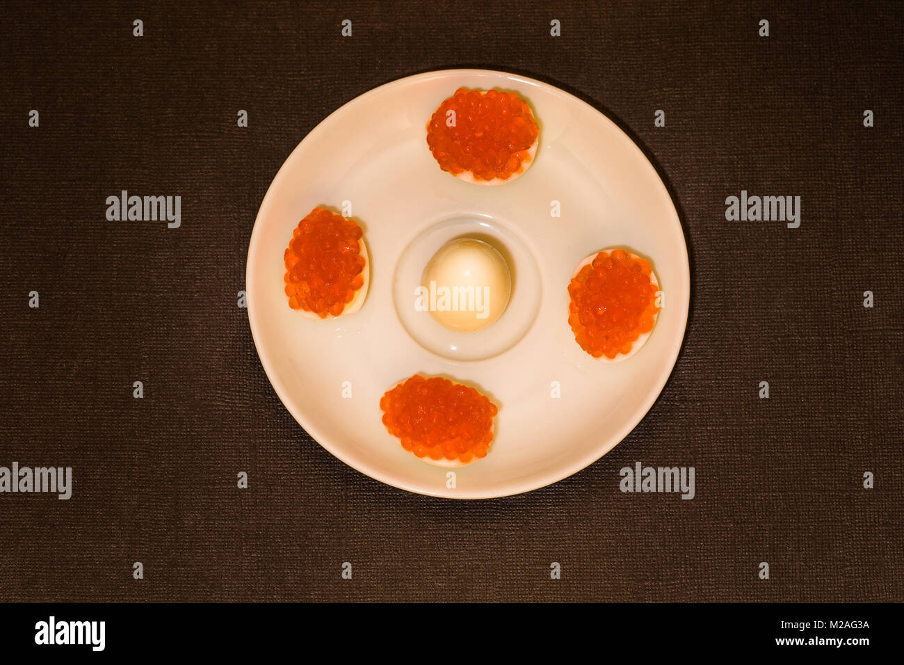 Quail eggs with caviar Stock Photo Alamy