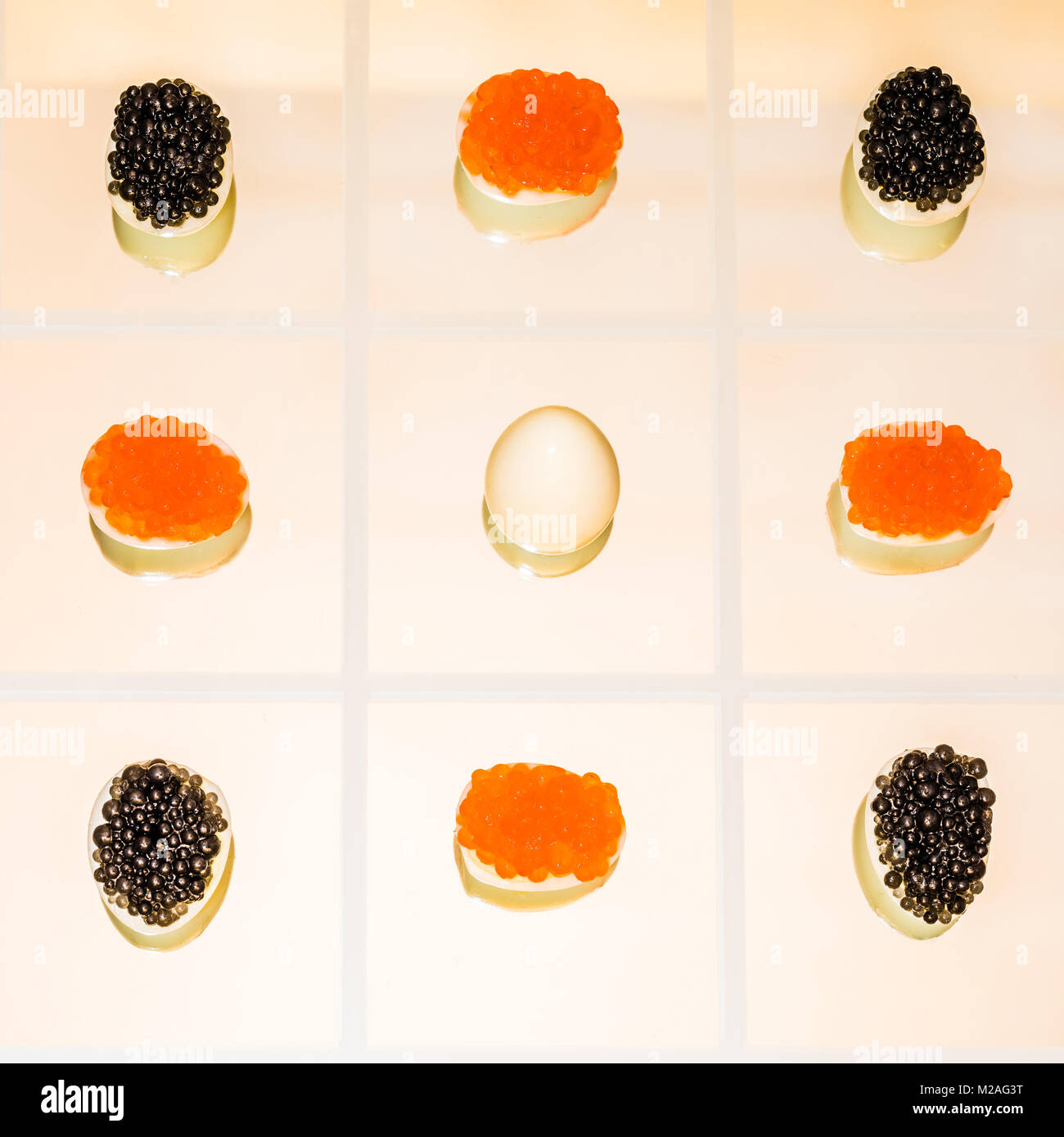 Quail eggs with caviar Stock Photo