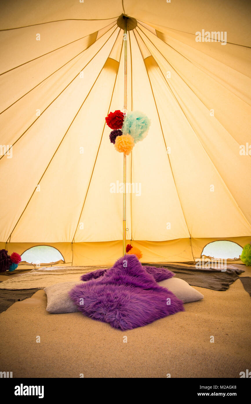 Tent interior with hanging decorations and cushions Stock Photo Alamy