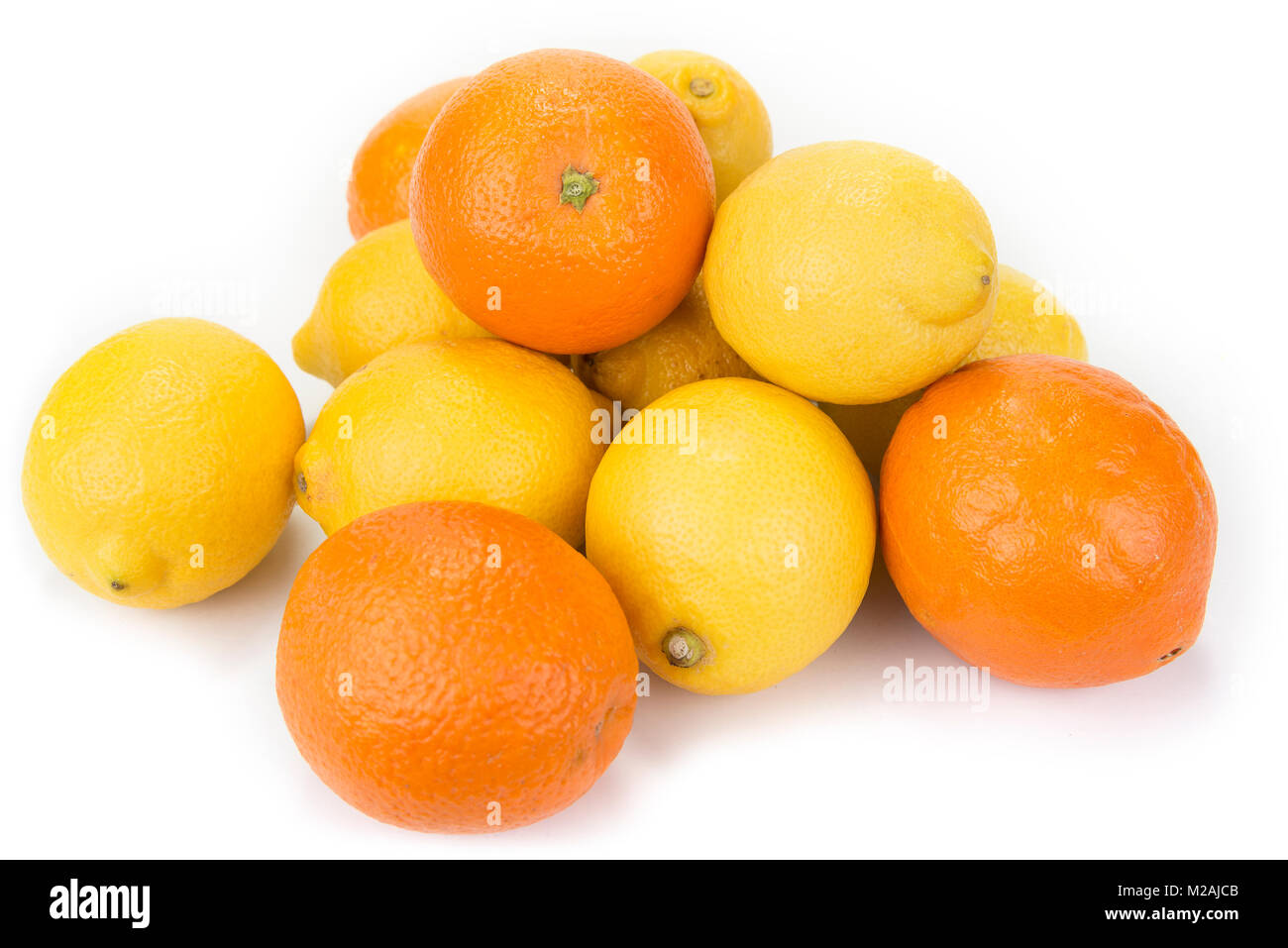Fresh oranges and lemons on the white background Stock Photo