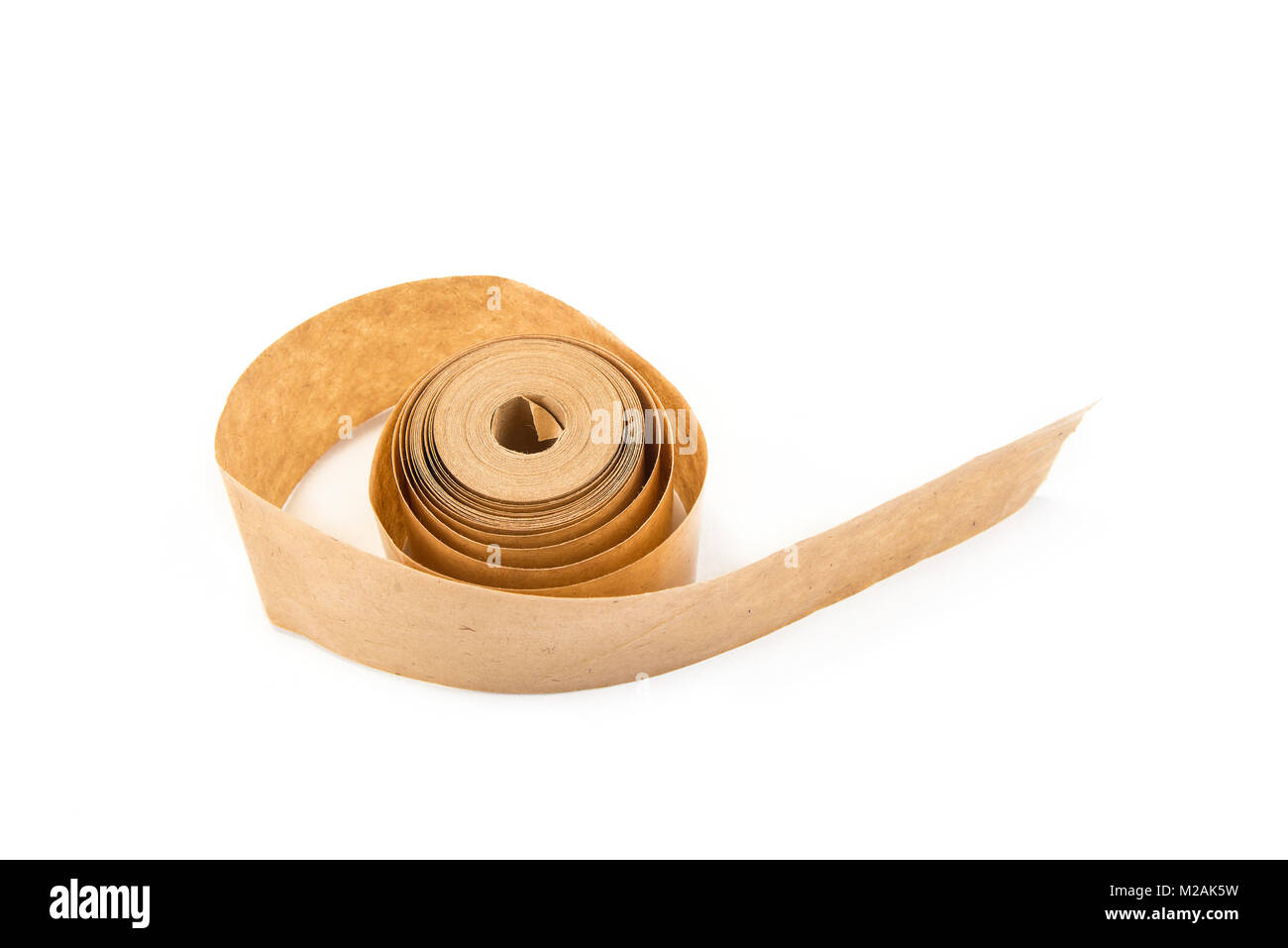Brown roll of old paper tape for office on the white Stock Photo - Alamy