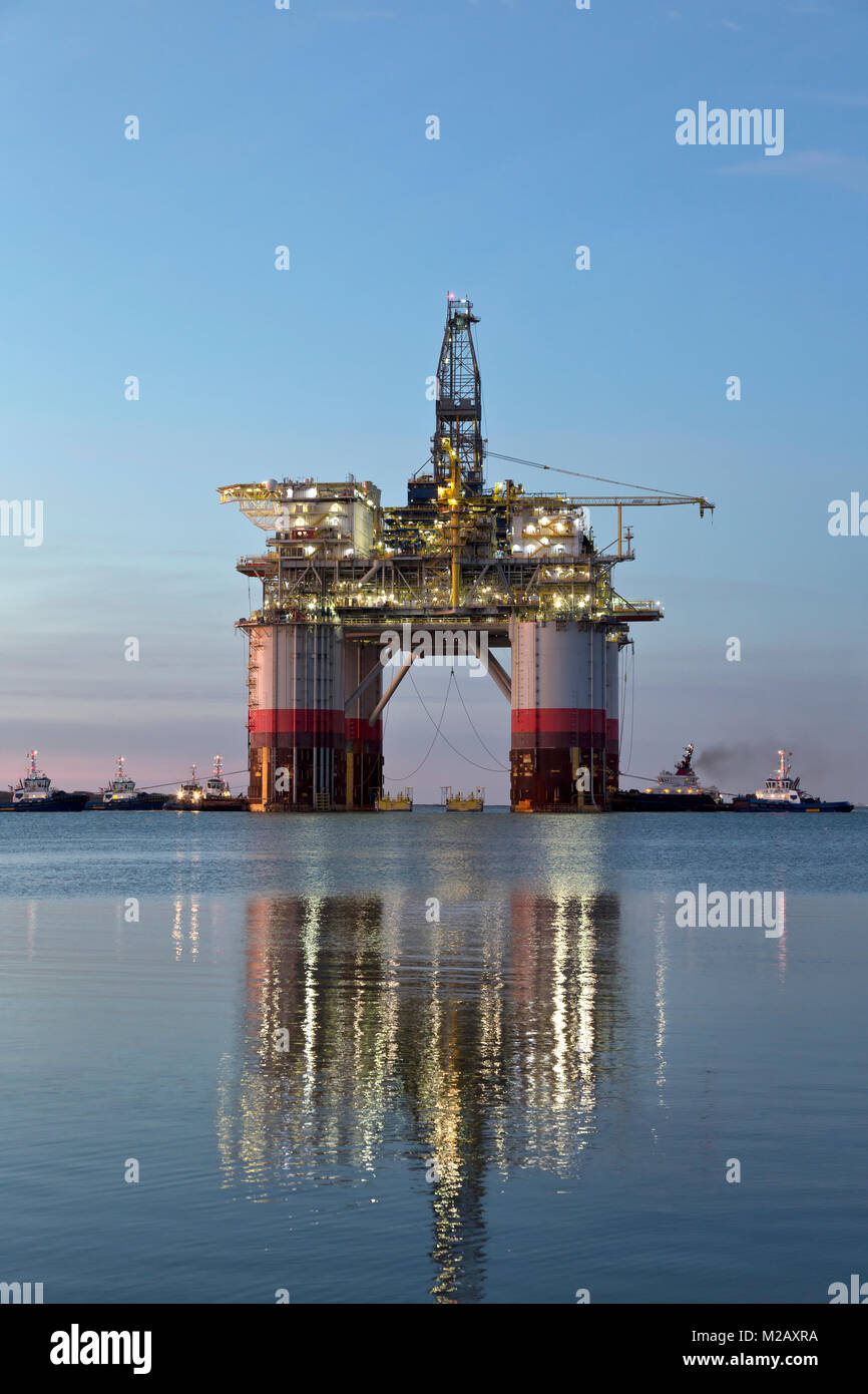 'Big Foot'  Chevron's Deep Ocean Platform departs from Kiewit,  oil & natural gas drill rig, at dawn, departed Ingleside 4 am January 30, 2018. Stock Photo