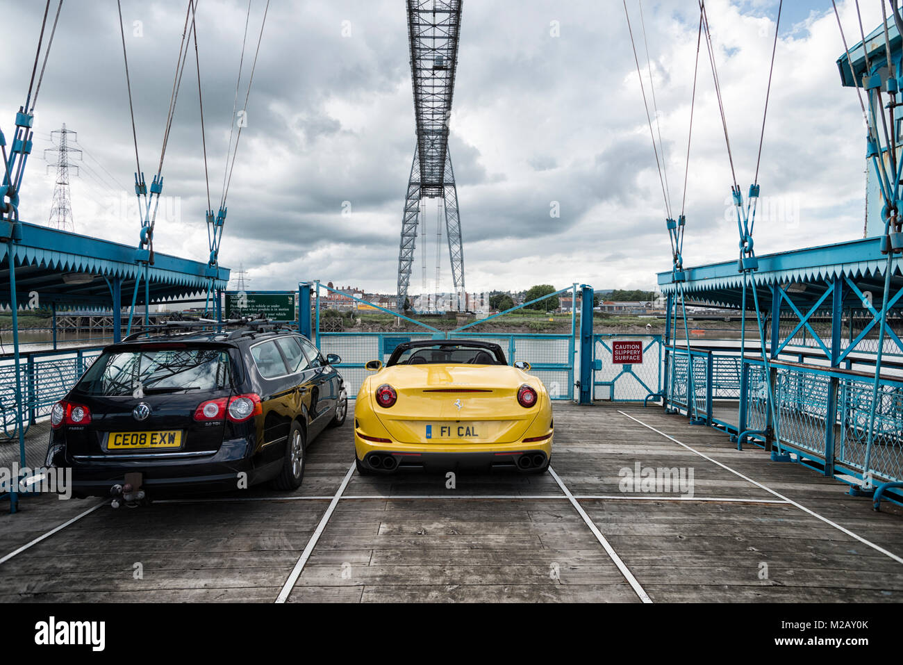 A yellow Ferrari F1 California pictured at Newport Transport Bridge, Pill, South Wales. Stock Photo