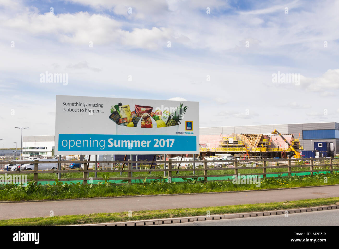 Billboard announcing the new Aldi store at Bridgewater Avenue on the Logistics North site, Bolton. The Aldi distribution centre is on the same site. Stock Photo