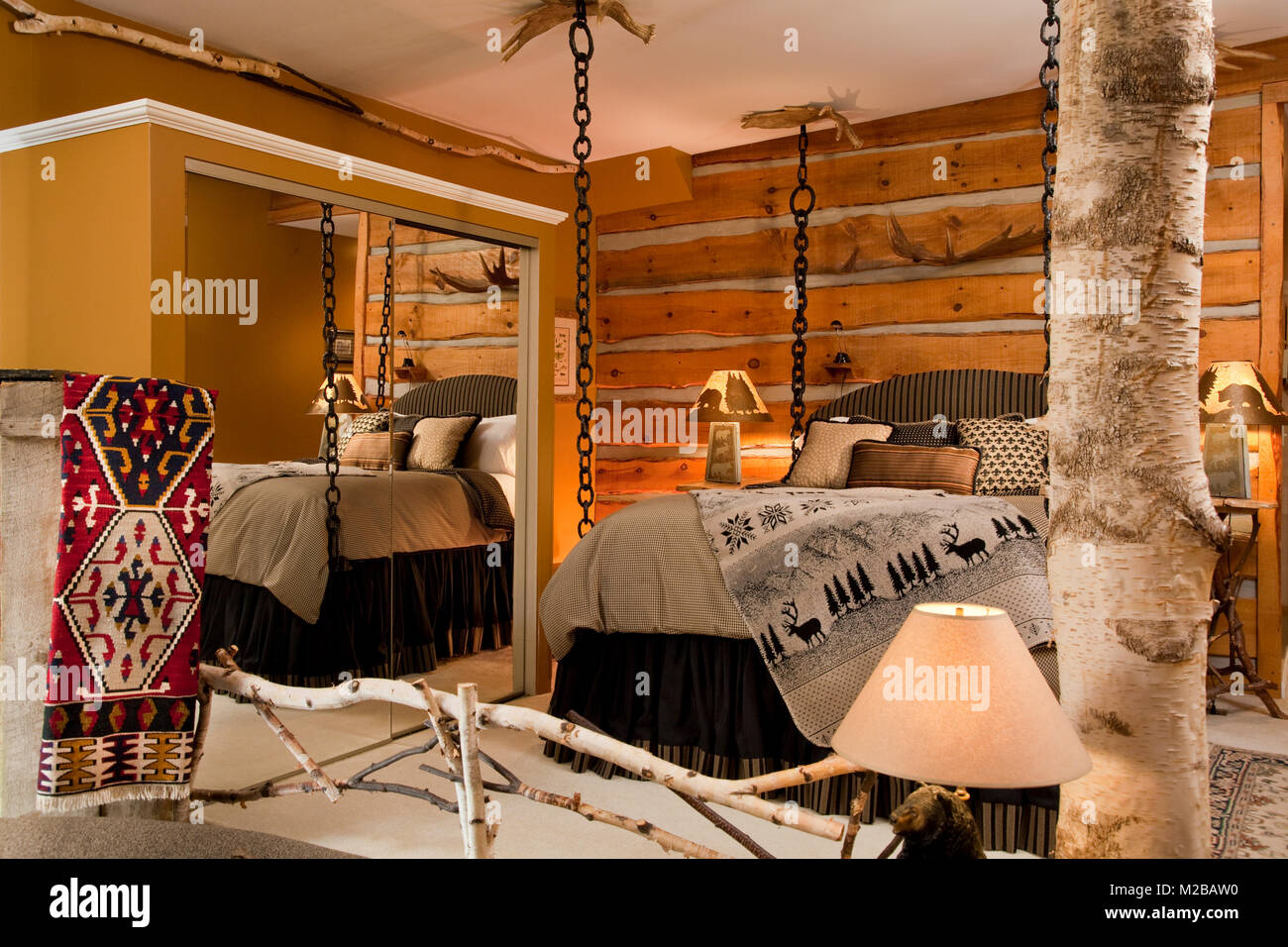 Log home bedroom interior hi-res stock photography and images - Alamy, image size:1300x956