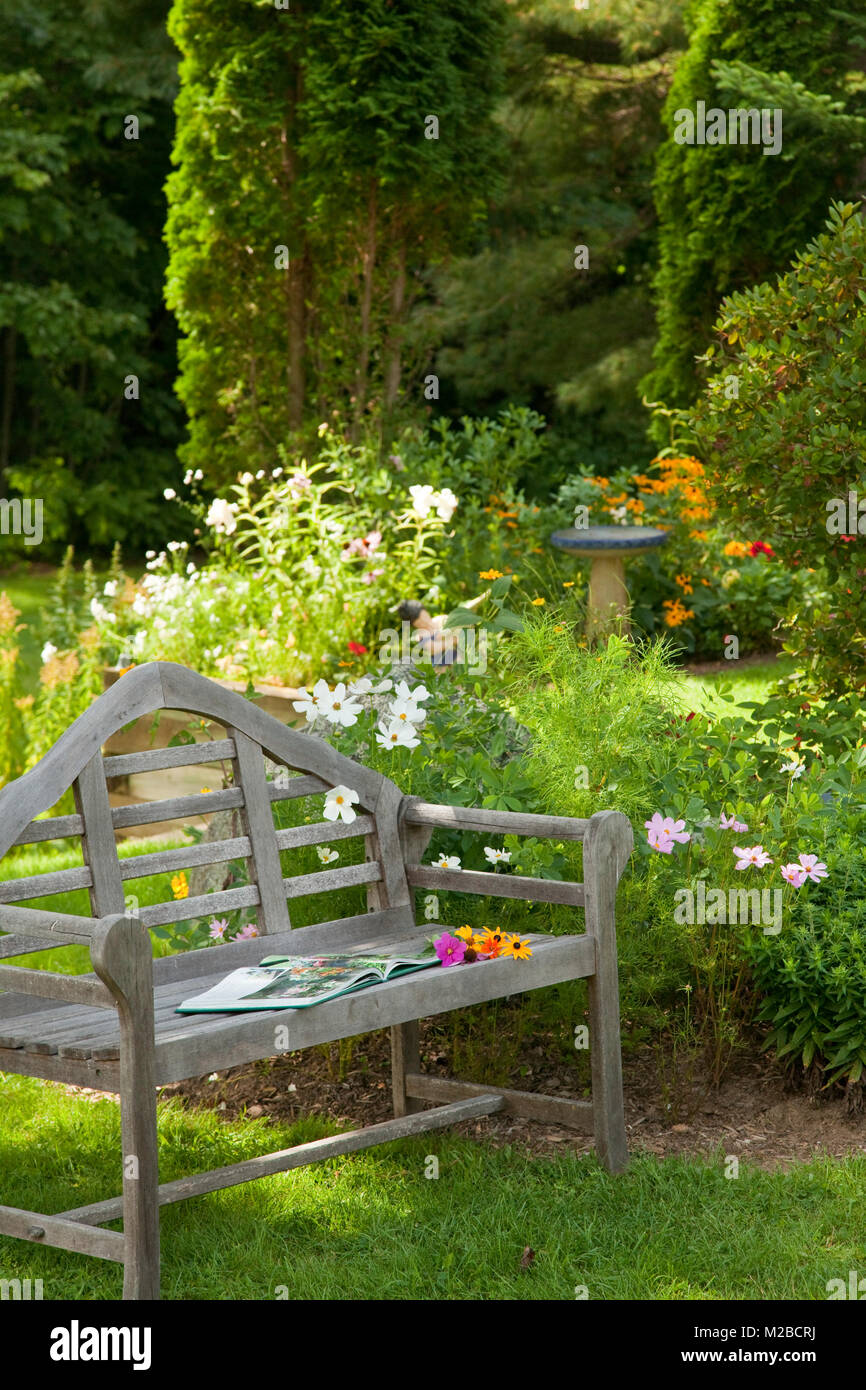 Bench with Book in Garden,Waterford Inne,Waterford,Maine Stock Photo
