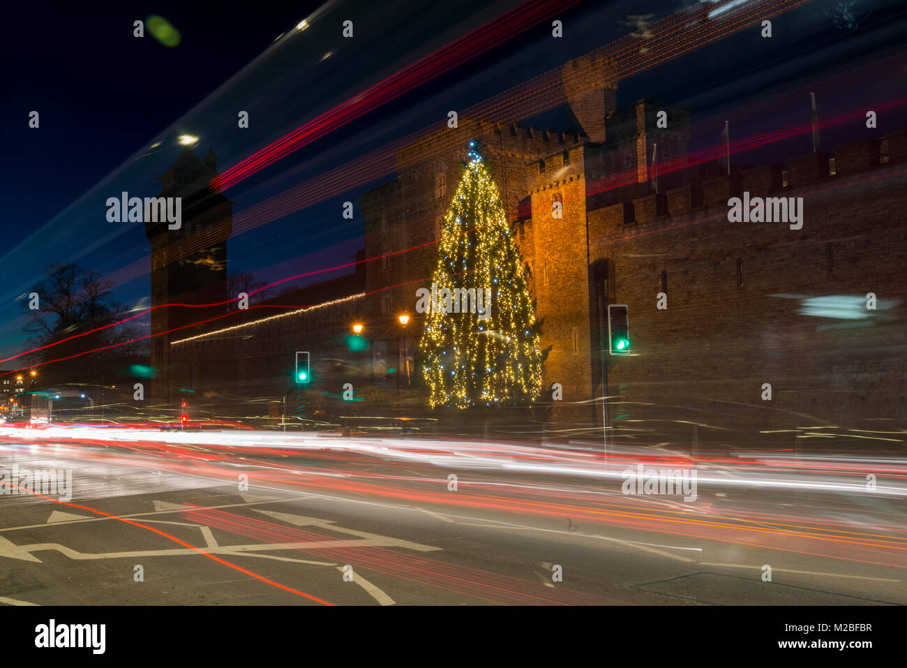 Streaming traffic lights add to the Christmas lights and tree around