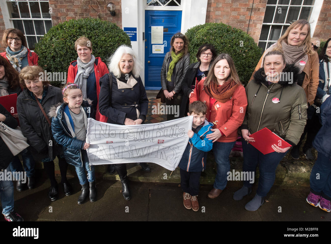 3 Trinity Street, Stratford-upon-Avon, Warwickshire, UK. 28th January 2018. A group of protesters hold a demonstration outside the Conservative consti Stock Photo