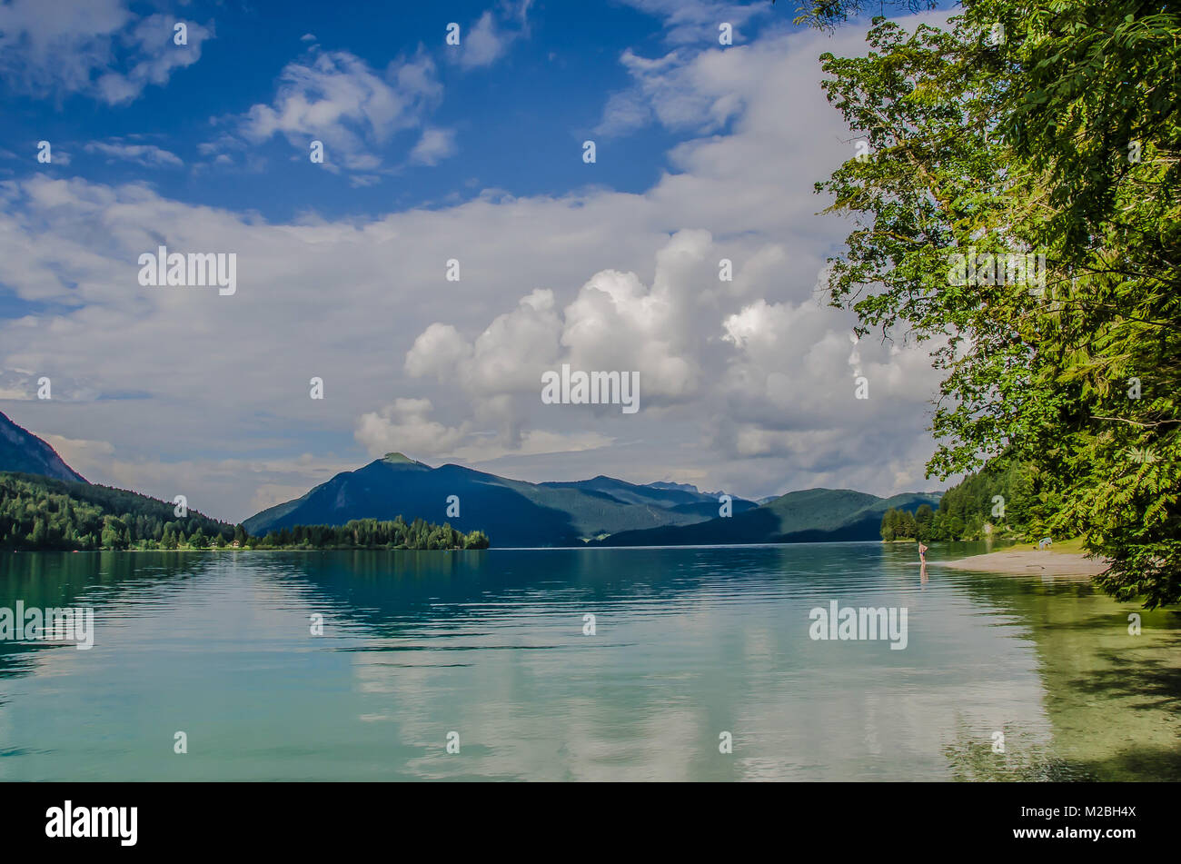 Walchensee or Lake Walchen is a beautiful lake nestled in between the peaks of the Heimgarten and the Herzogstand mountains. Stock Photo