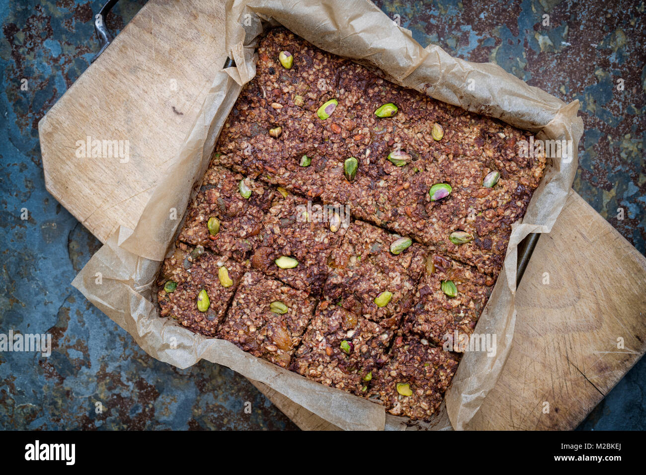 Homemade seed, nut, dried fruit and dark chocolate Oat Energy bars on