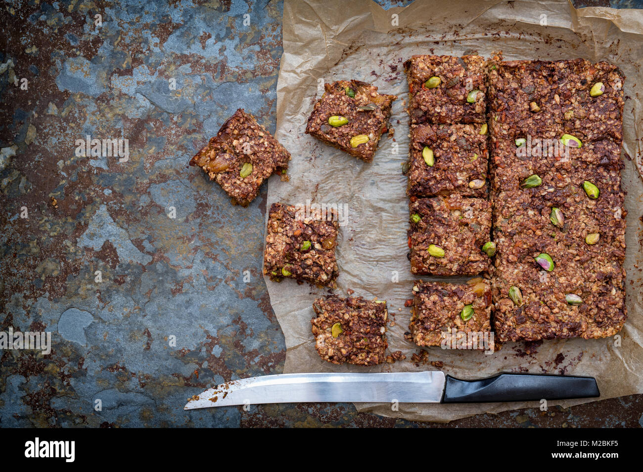 Homemade seed, nut, dried fruit and dark chocolate Oat Energy bars on