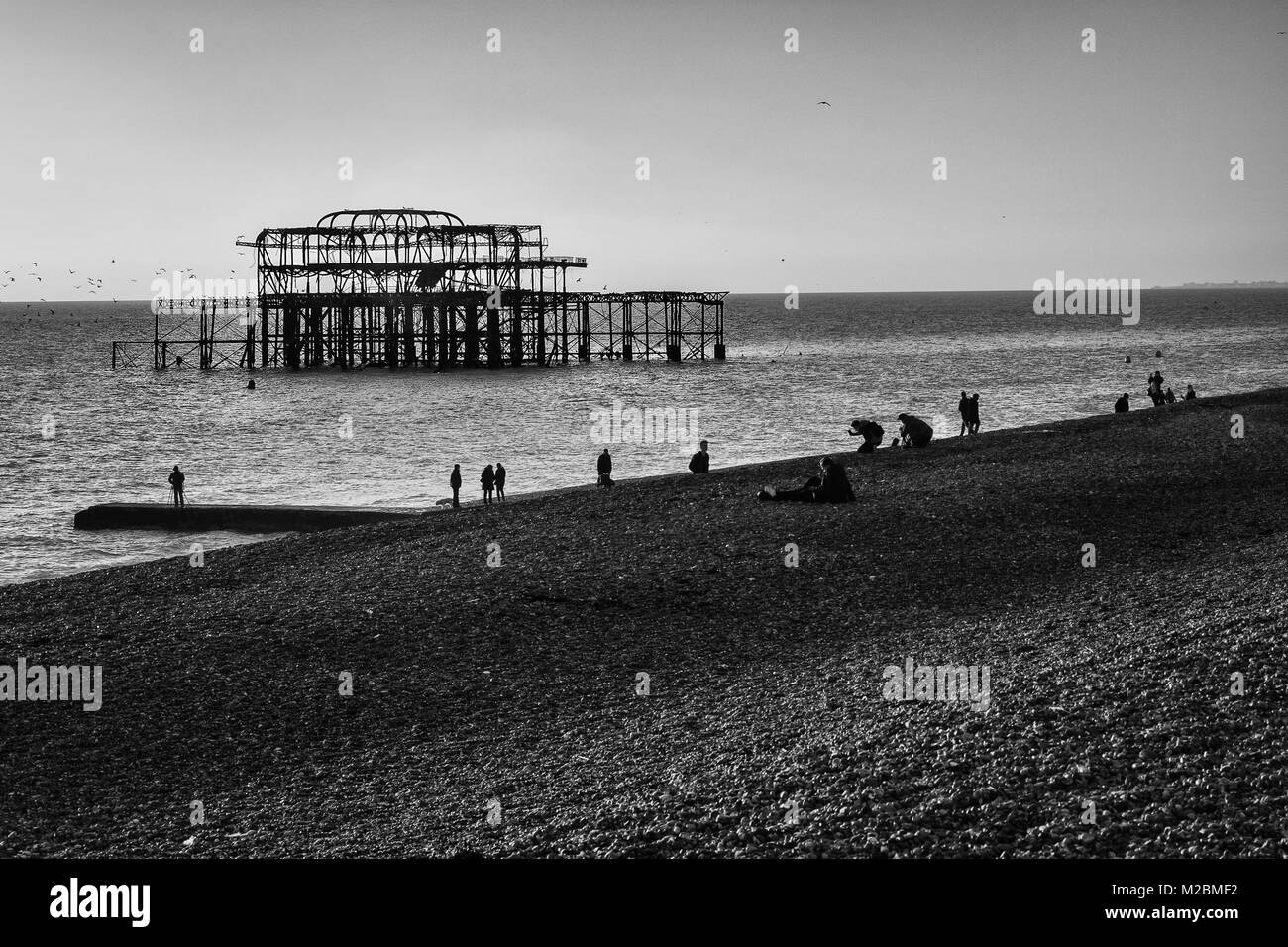 The old Brighton Pier which is now just a shell. Shot in winter in black and white Stock Photo