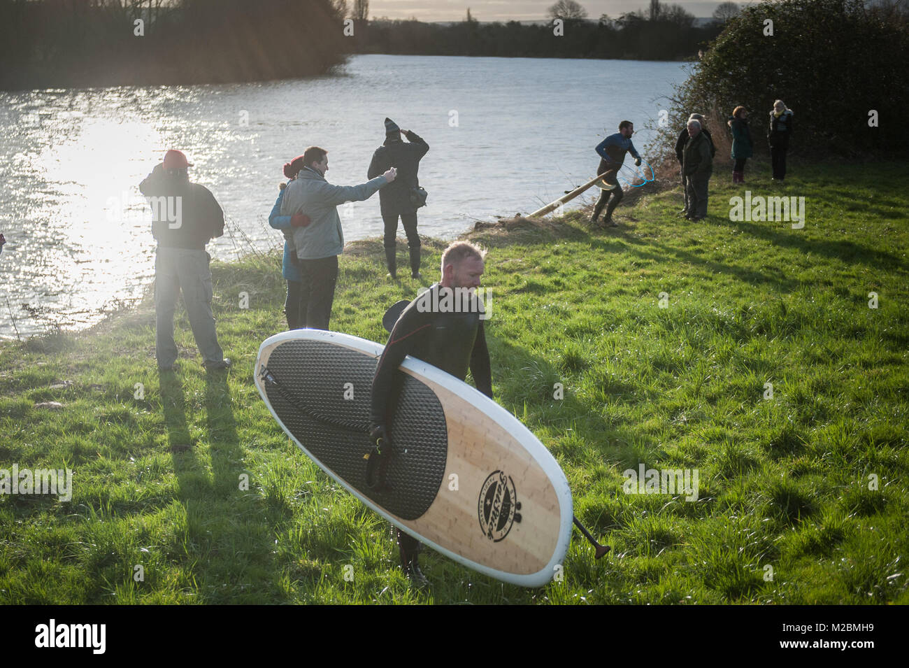 Minsterworth, Gloucestershire, UK. 2nd February 2018. Scores of Severn surfers were out in force today for the biggest bore of the year so far. Specta Stock Photo