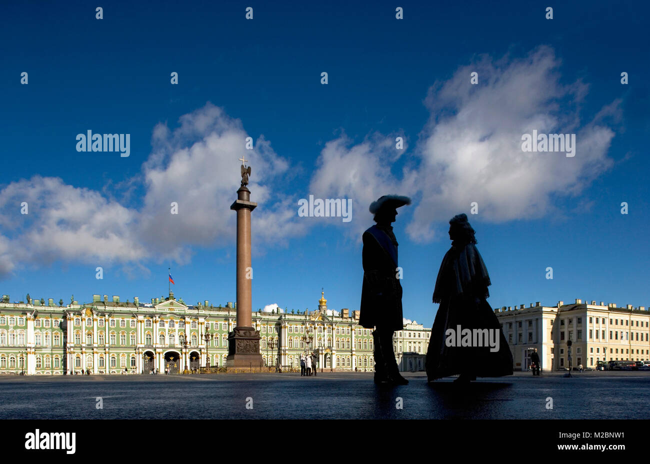 Russia. Saint Petersburg. Alexander pillar, Winter Palace and Hermitage on Palace Square. People in period costume. UNESCO World Heritage Site. Stock Photo