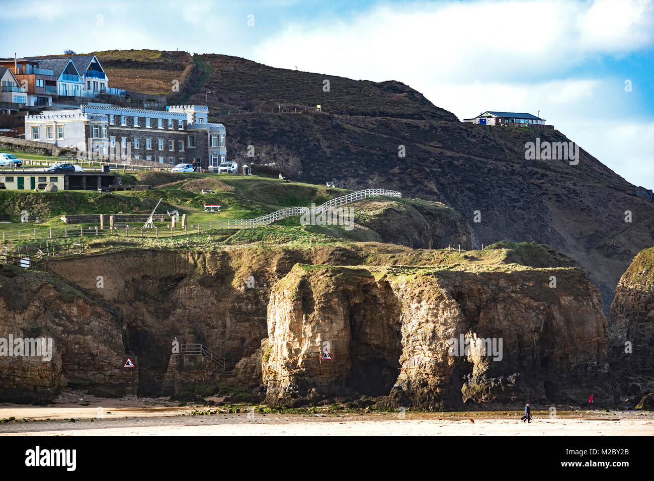 hotels and holiday apartments, on cliffs above the beach at perranporth in cornwall, england