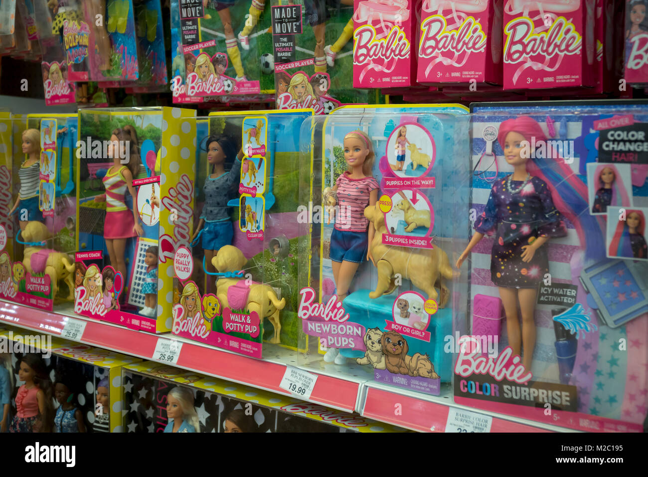 An assortment of various Mattel Barbie Dolls in the Toys R Us location in  Times Square in New York on Friday, February 2, 2018. Mattel recently  reported fourth-quarter sales, the holiday season,
