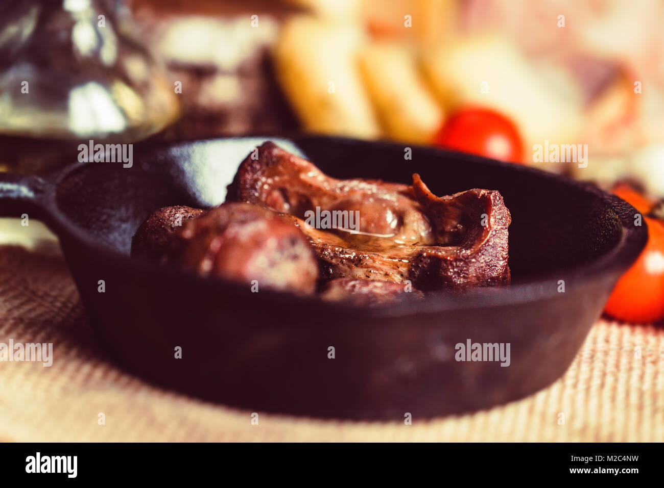 Tasty roasted chicken giblets in pan Stock Photo Alamy