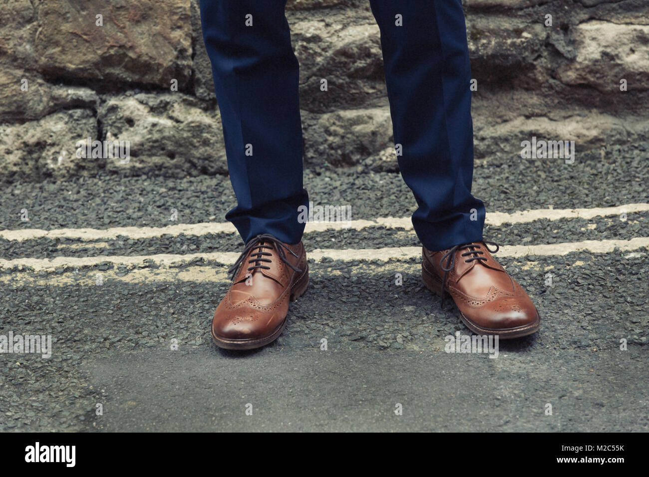 Brown shoes blue trousers hi-res stock photography and images - Alamy
