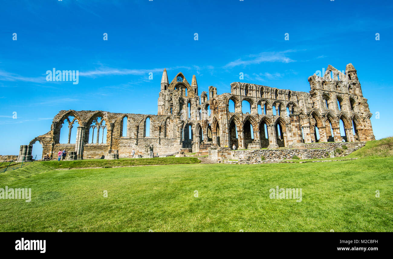 Ruins of Whitby Abbey stand out against clear blue skies, Whitby, Yorkshire, UK Stock Photo