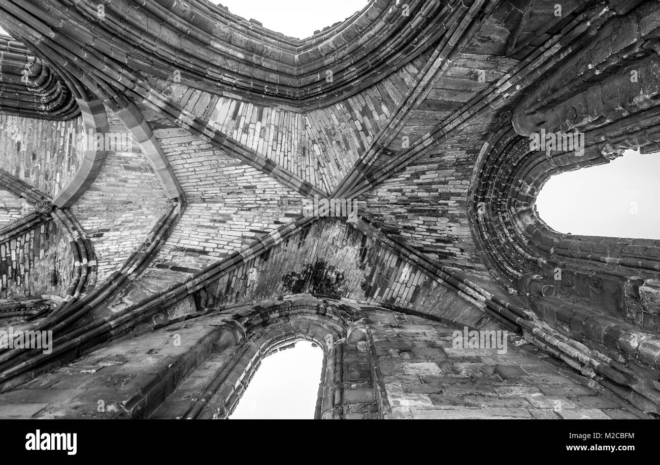 Looking up at cross section of archways of Whitby Abbey, Whitby, Yorkshire, UK Stock Photo