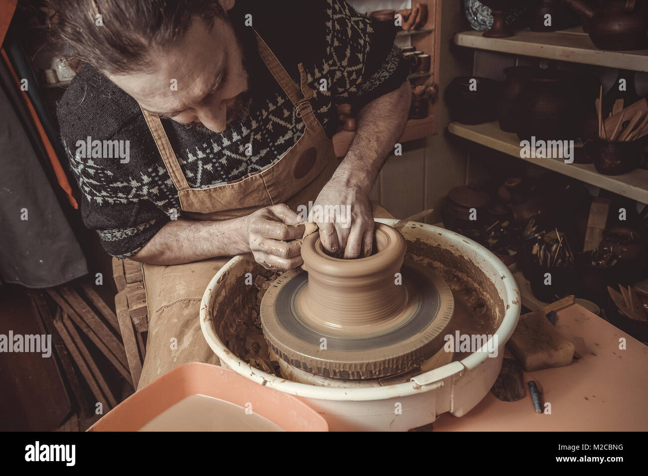 Potter's wheel ancient hi-res stock photography and images - Alamy
