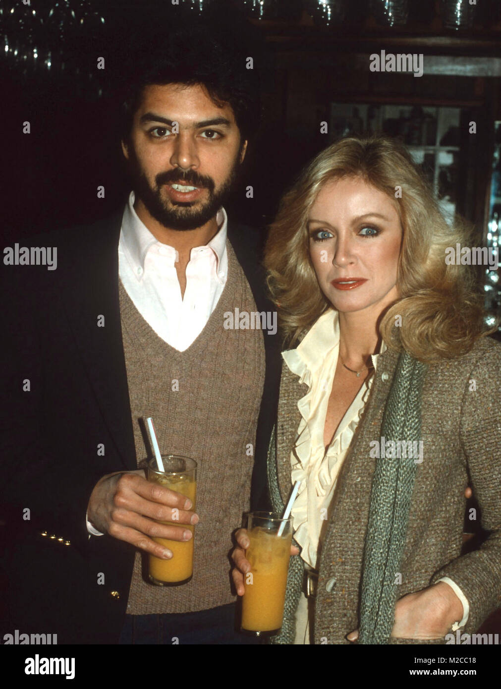 LOS ANGELES, CA - JANUARY 10: Richard Holland and actress Donna Mills attends the 'Entertainment Tonight' 100th Episode Celebration at Su Ling Restaurant on January 10, 1982 in Los Angeles, California. Photo by Barry King/Alamy Stock  Photo Stock Photo