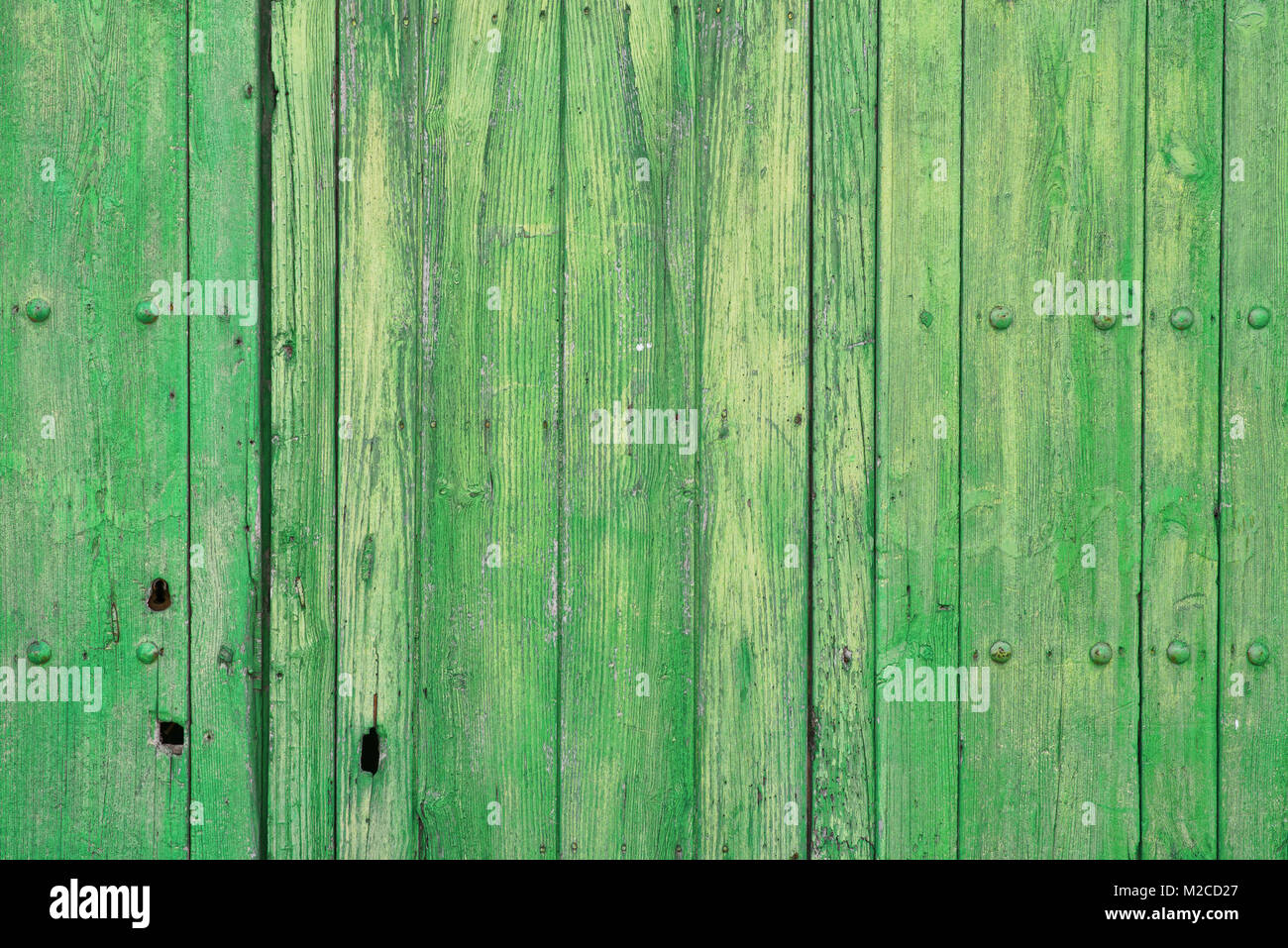 Weathered wooden door painted in green, a background Stock Photo - Alamy