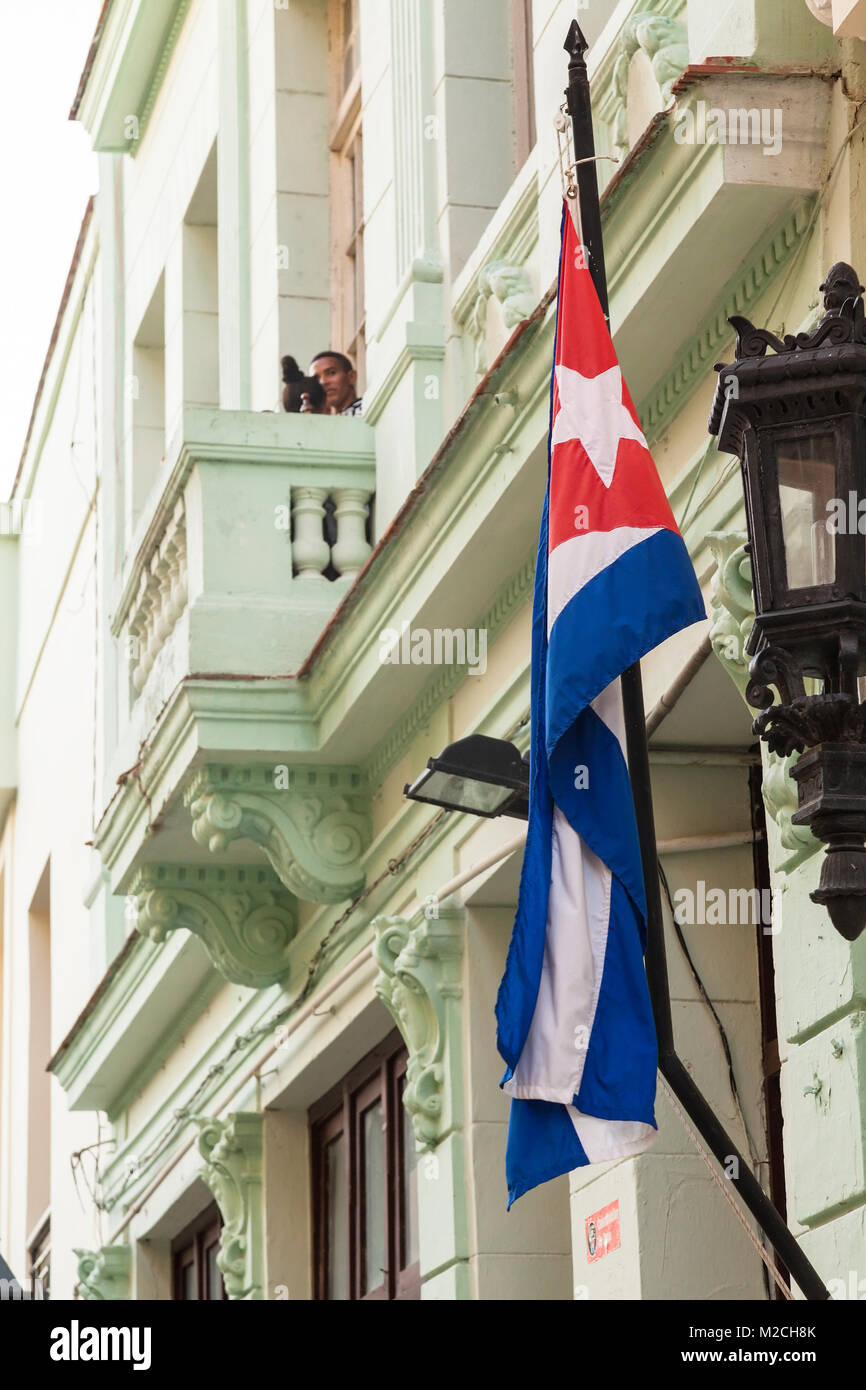 A Cuban flag hanging in the street in Havana, Cuba. Stock Photo