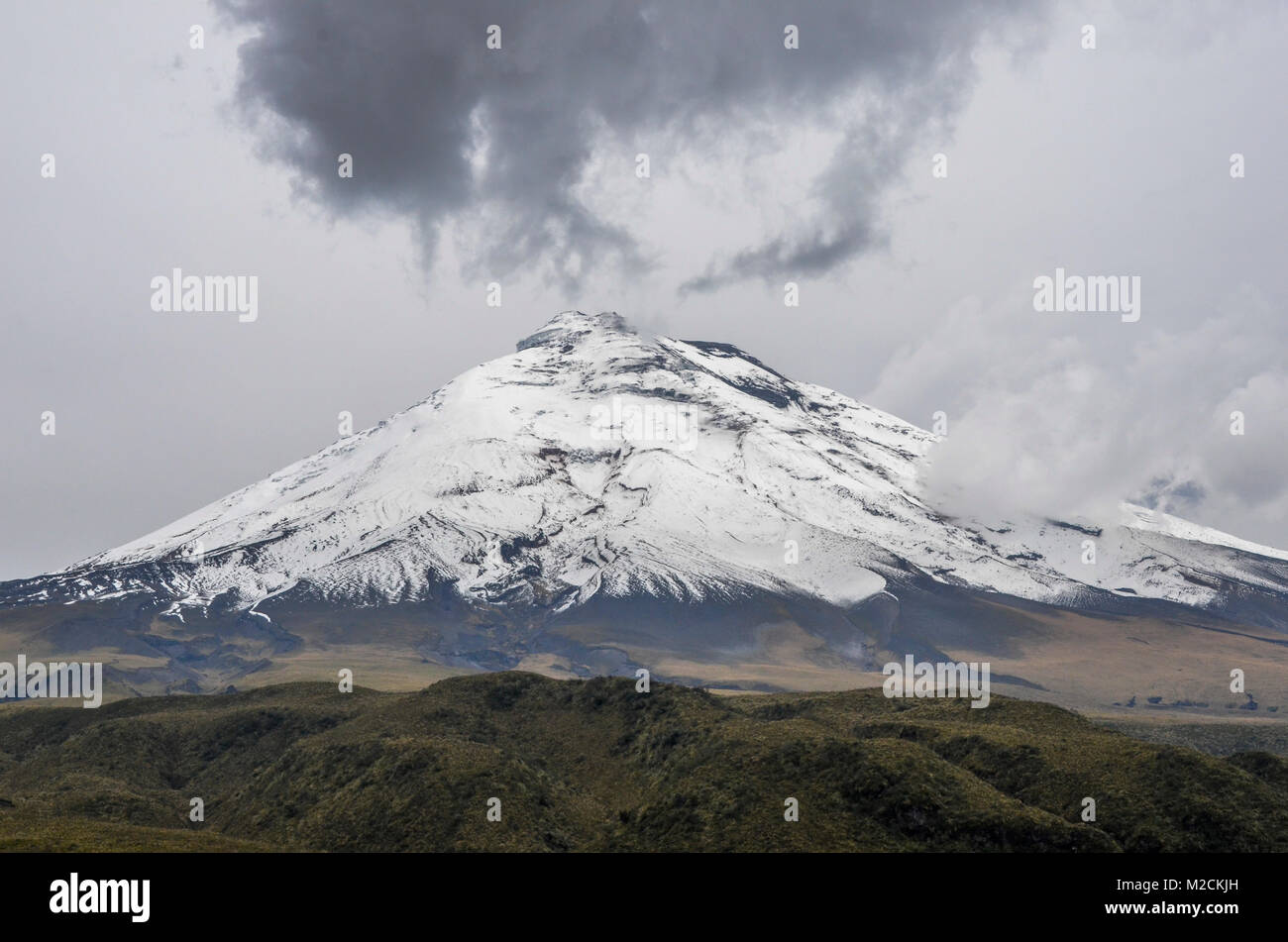 Cotopaxi is an active stratovolcano in the Andes Mountains, reaching a height of 5,897 m (19,347 ft) Stock Photo