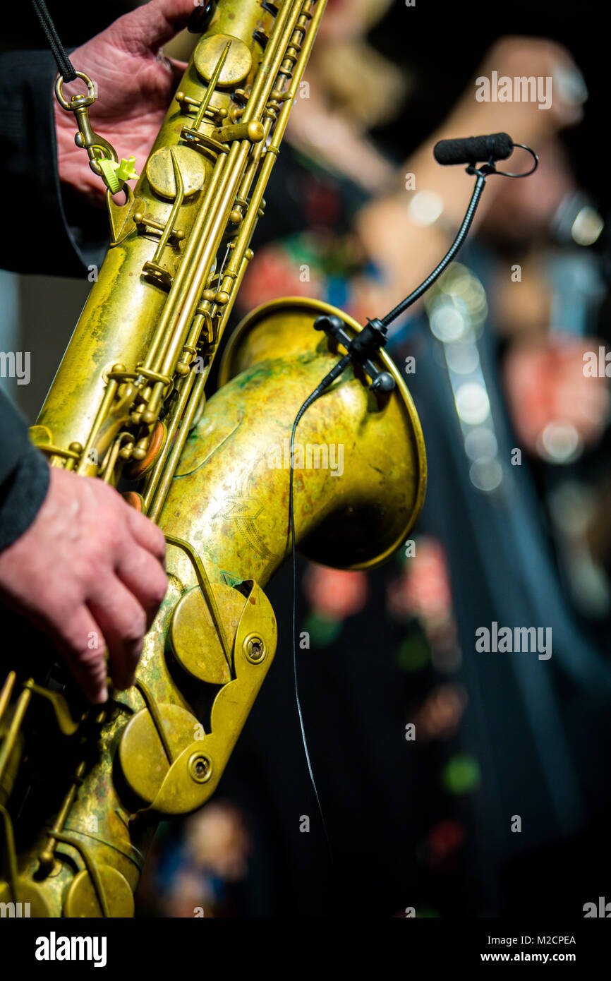Saxophone player performing on the stage at night Stock Photo Alamy