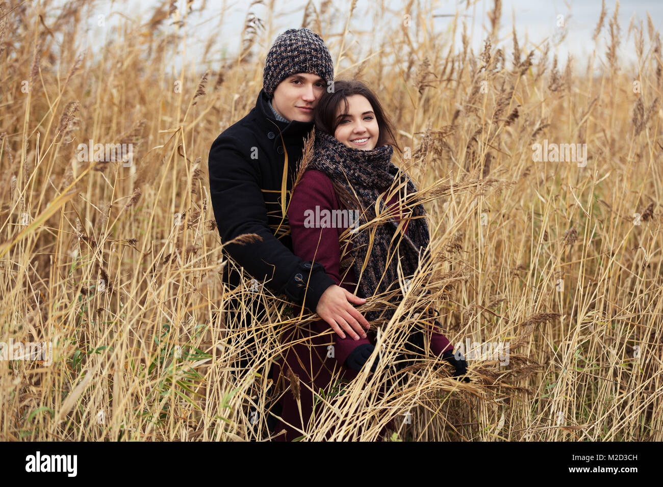 Happy young couple in love walking outdoor Stock Photo - Alamy